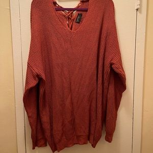 Knitted burnt orange tie back sweater